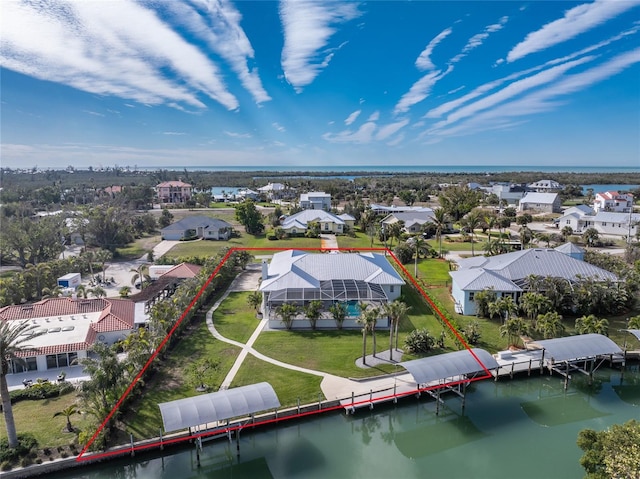 drone / aerial view with a water view