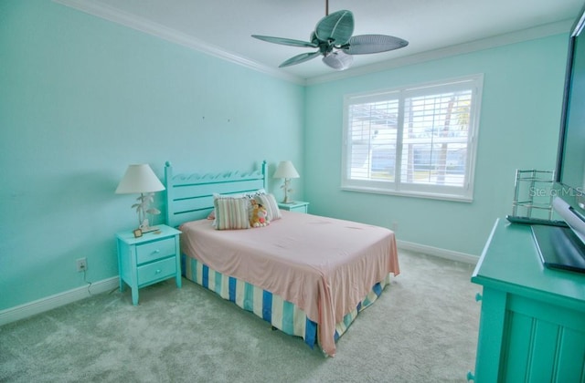 bedroom with ornamental molding, light carpet, and ceiling fan