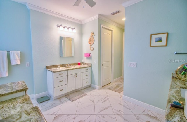 bathroom featuring crown molding, vanity, and ceiling fan