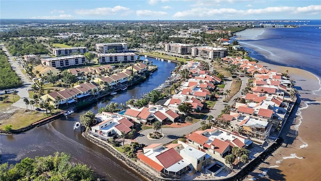 bird's eye view with a water view