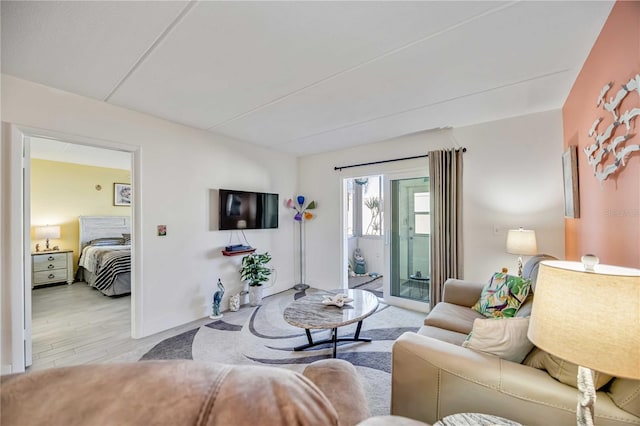 living room with light hardwood / wood-style floors