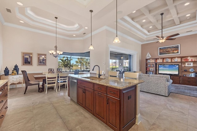 kitchen with coffered ceiling, sink, hanging light fixtures, light stone countertops, and a high ceiling