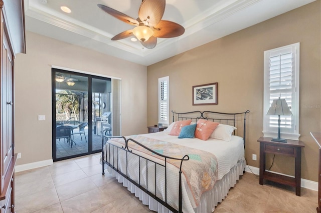 tiled bedroom with crown molding, a tray ceiling, access to outside, and ceiling fan