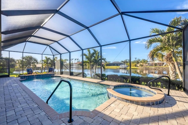 view of swimming pool featuring a patio, an in ground hot tub, a lanai, pool water feature, and a water view