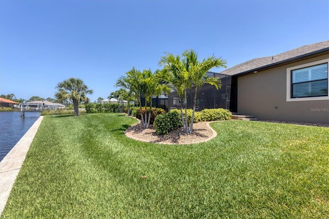 view of yard with a water view