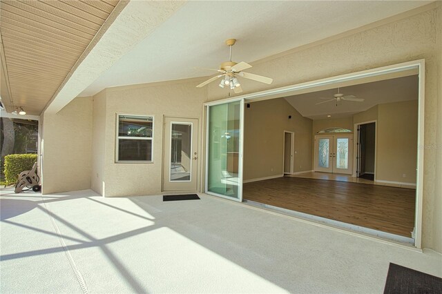 view of patio with french doors and ceiling fan