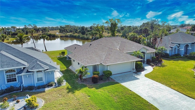 birds eye view of property featuring a water view