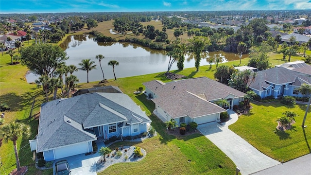 drone / aerial view with a water view