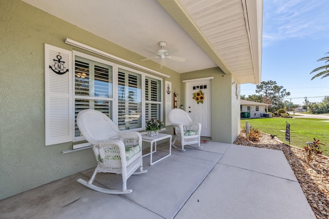 view of patio with ceiling fan