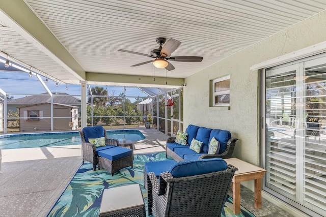 view of patio / terrace featuring a lanai, an outdoor hangout area, and ceiling fan