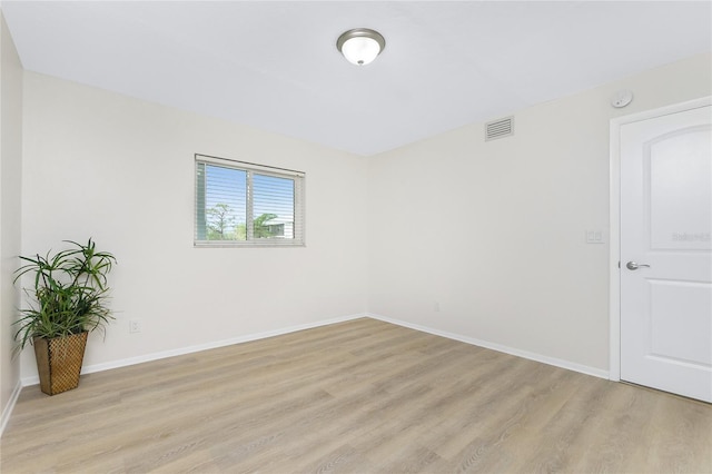 empty room featuring light hardwood / wood-style floors