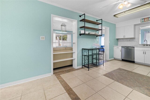 539 Shore Rd, Nokomis, FL 34275 - kitchen with dishwasher, white cabinets, crown molding, ceiling fan, and light countertops