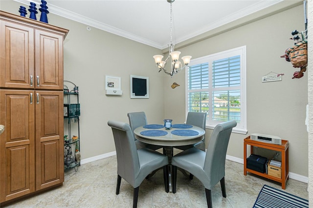 dining area with ornamental molding and a notable chandelier