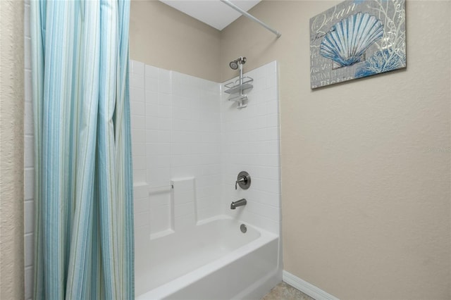 bathroom featuring shower / bath combination with curtain