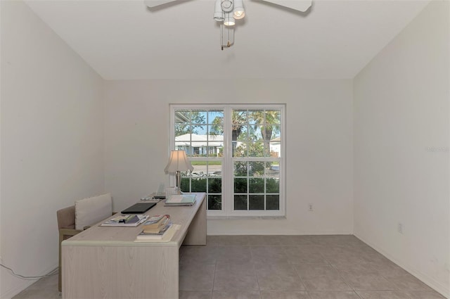 tiled home office with ceiling fan