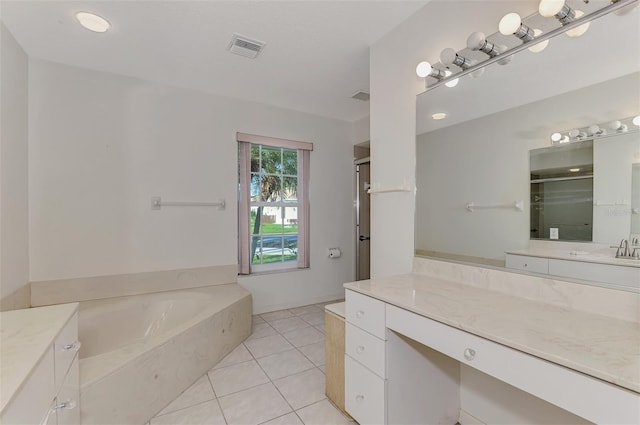 bathroom with vanity, shower with separate bathtub, and tile patterned floors