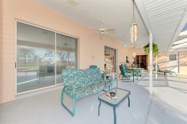 view of patio featuring outdoor lounge area and ceiling fan