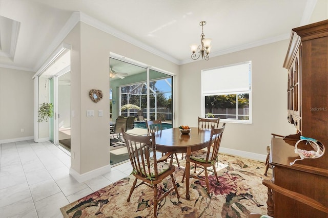 dining area featuring a notable chandelier and crown molding