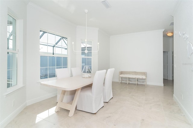 dining area with crown molding