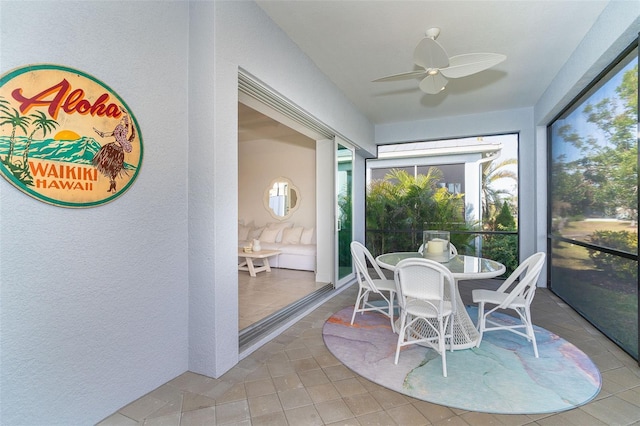 sunroom / solarium with ceiling fan