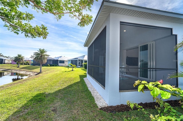 view of yard featuring a sunroom