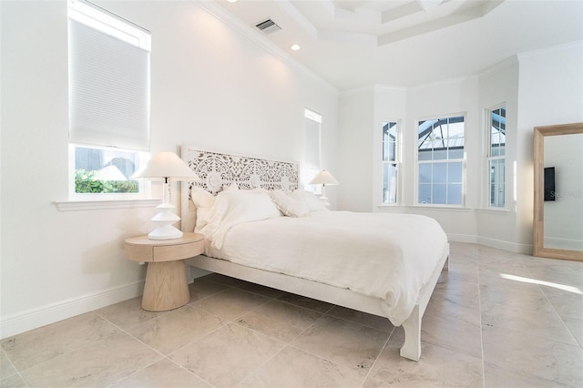 bedroom with a towering ceiling and ornamental molding