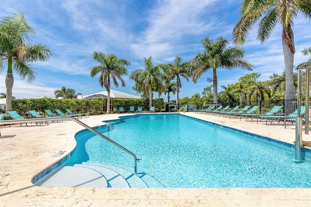 view of swimming pool featuring a patio