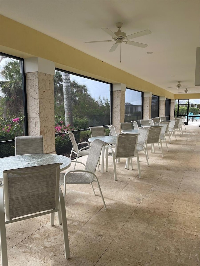 view of patio / terrace featuring ceiling fan