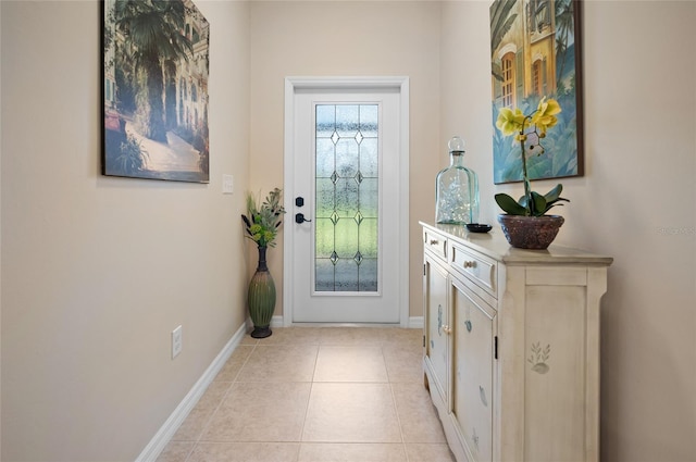 entryway with light tile patterned flooring