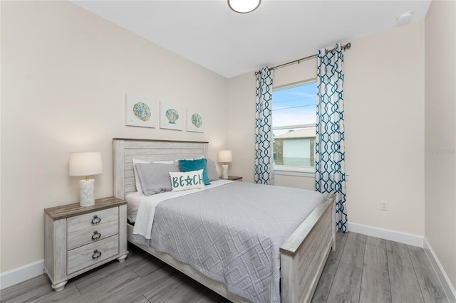 bedroom featuring hardwood / wood-style flooring