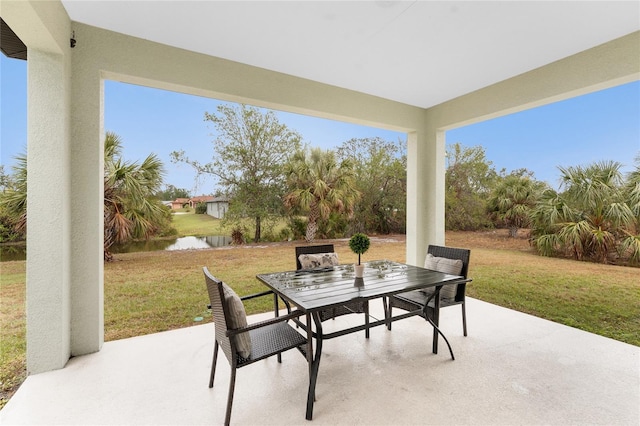 view of patio / terrace featuring a water view