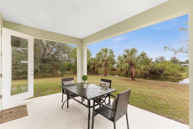 view of patio / terrace with a water view