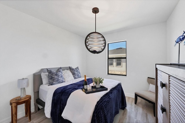 bedroom featuring light hardwood / wood-style floors