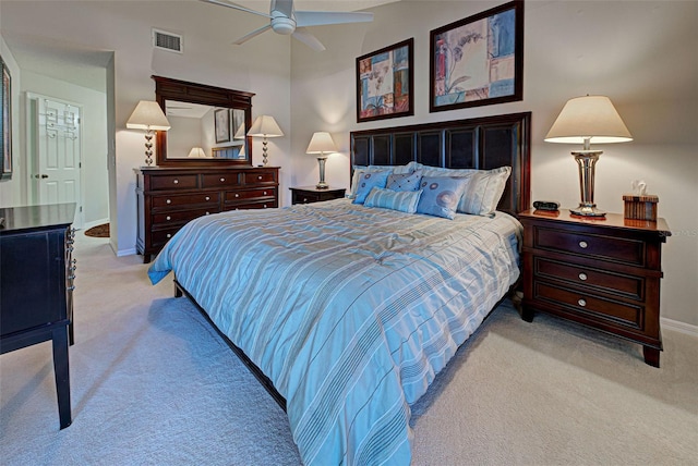 bedroom with light colored carpet and ceiling fan