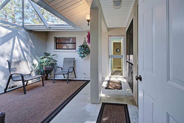 property entrance featuring a patio