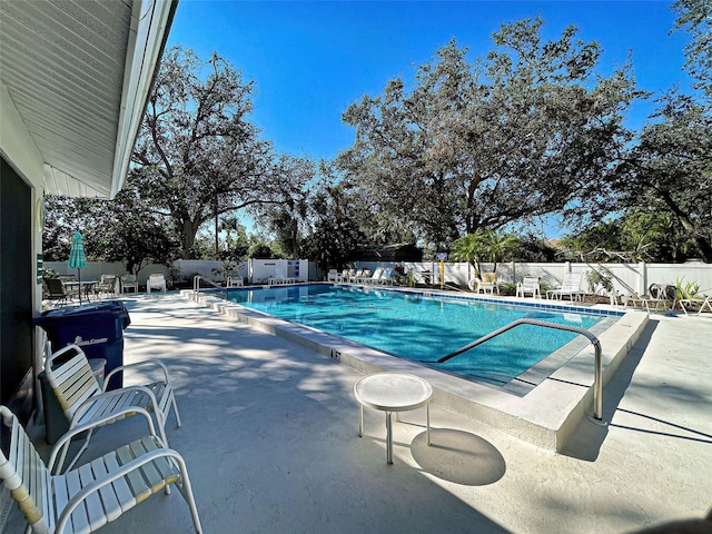 view of pool featuring a patio area