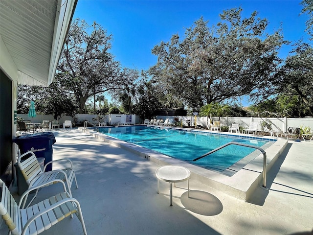 view of pool featuring a patio area