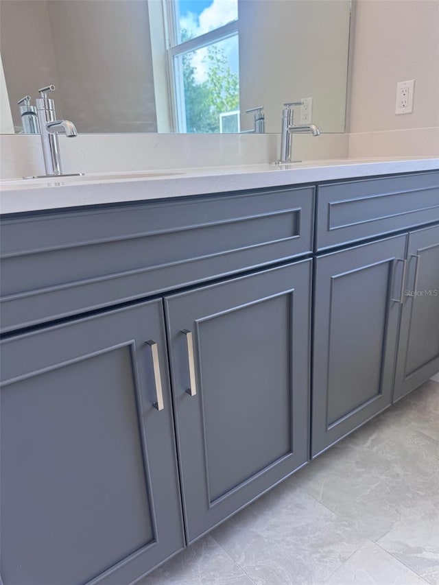 full bathroom featuring double vanity