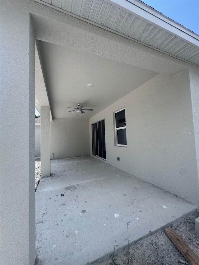 view of patio / terrace featuring ceiling fan