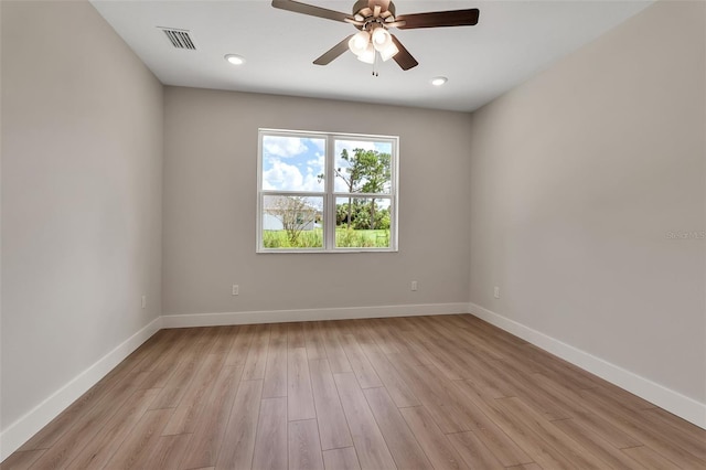 2814 Vogler Ln, North Port, FL 34286 - empty room featuring a ceiling fan, light wood-style floors, and recessed lighting
