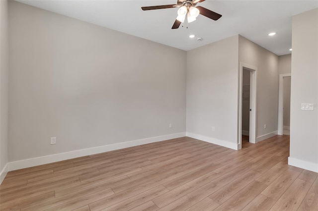 2814 Vogler Ln, North Port, FL 34286 - empty room featuring a ceiling fan, light wood-style flooring, and recessed lighting