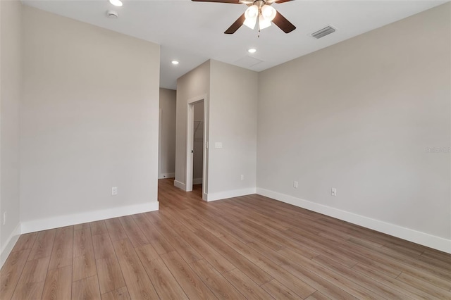 2814 Vogler Ln, North Port, FL 34286 - spare room with a ceiling fan, wood finished floors, a smoke detector, and recessed lighting