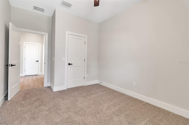 2814 Vogler Ln, North Port, FL 34286 - unfurnished bedroom with carpet and ceiling fan