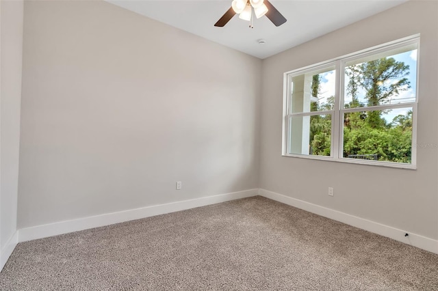 2814 Vogler Ln, North Port, FL 34286 - carpeted empty room with baseboards and ceiling fan