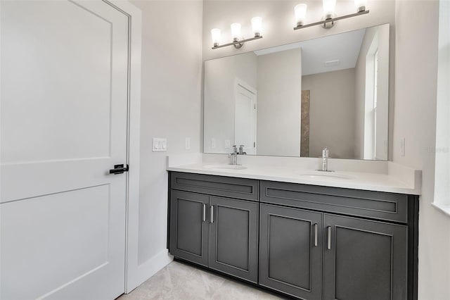 2814 Vogler Ln, North Port, FL 34286 - full bathroom featuring double vanity and baseboards