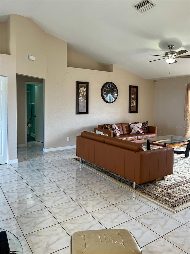 living room with ceiling fan and lofted ceiling