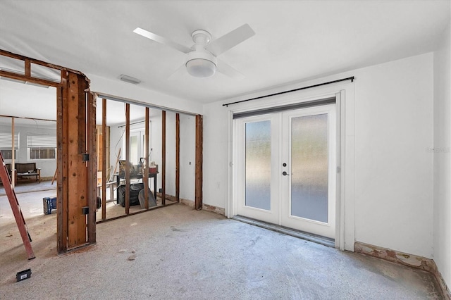 interior space with french doors and ceiling fan