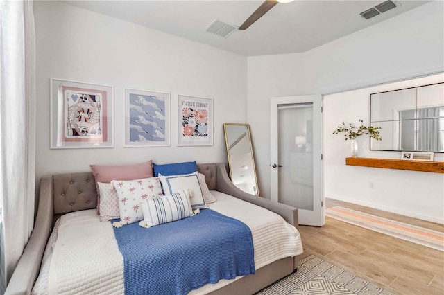 24269 Spartina Dr, Venice, FL 34293 - bedroom with ceiling fan and light hardwood / wood-style flooring