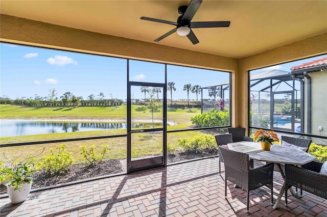 24269 Spartina Dr, Venice, FL 34293 - sunroom / solarium with ceiling fan and a water view