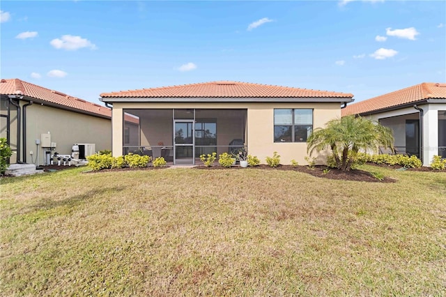 24269 Spartina Dr, Venice, FL 34293 - back of house featuring a yard and a sunroom